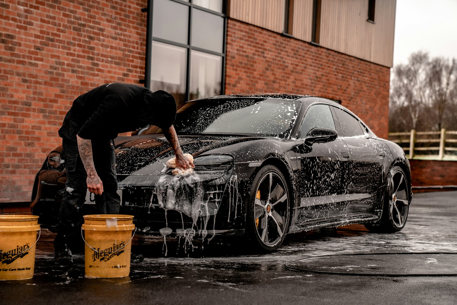 Water beading on a freshly ceramic coated car panel