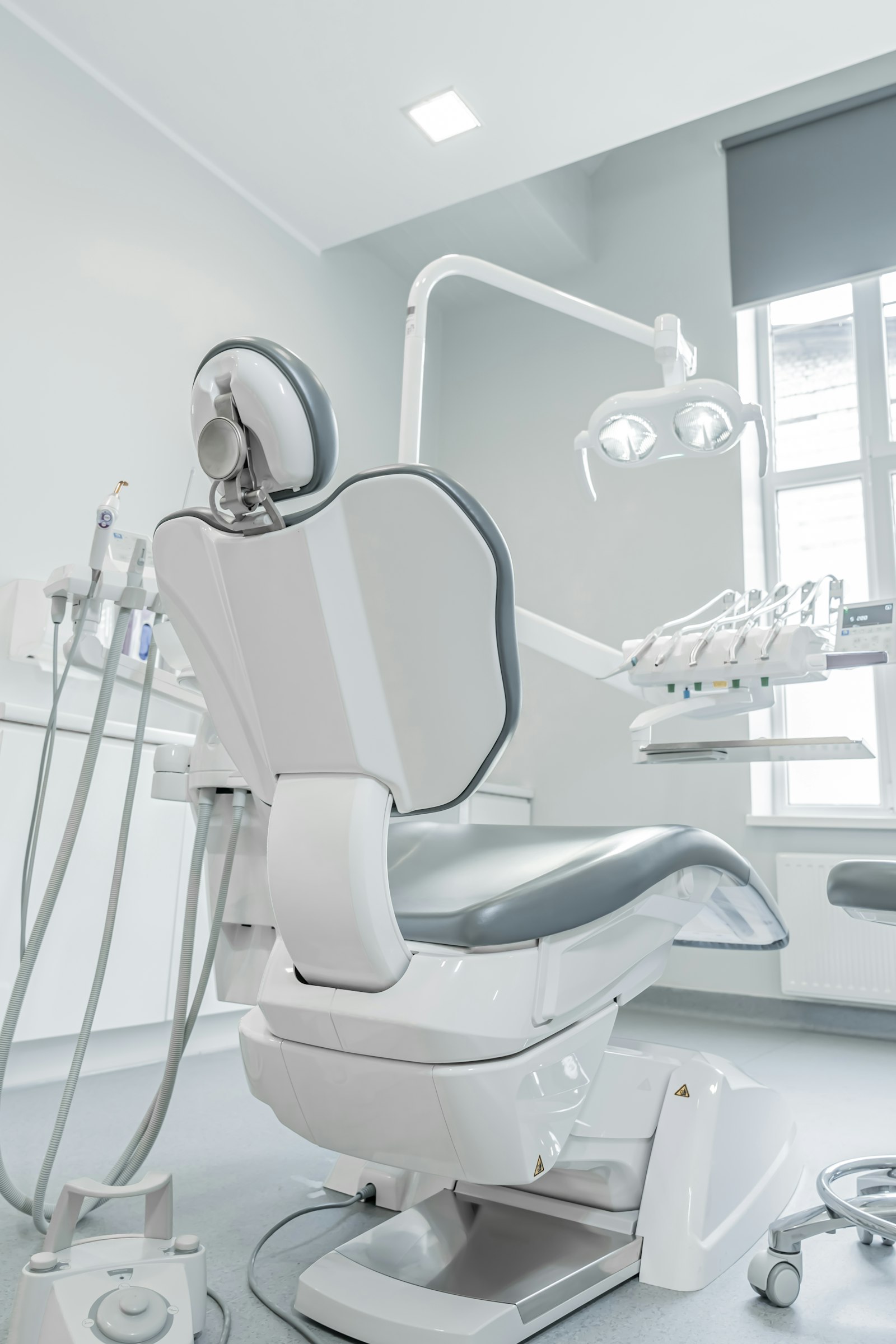 Calm Lumen Dental Studio treatment chair beside a bright window