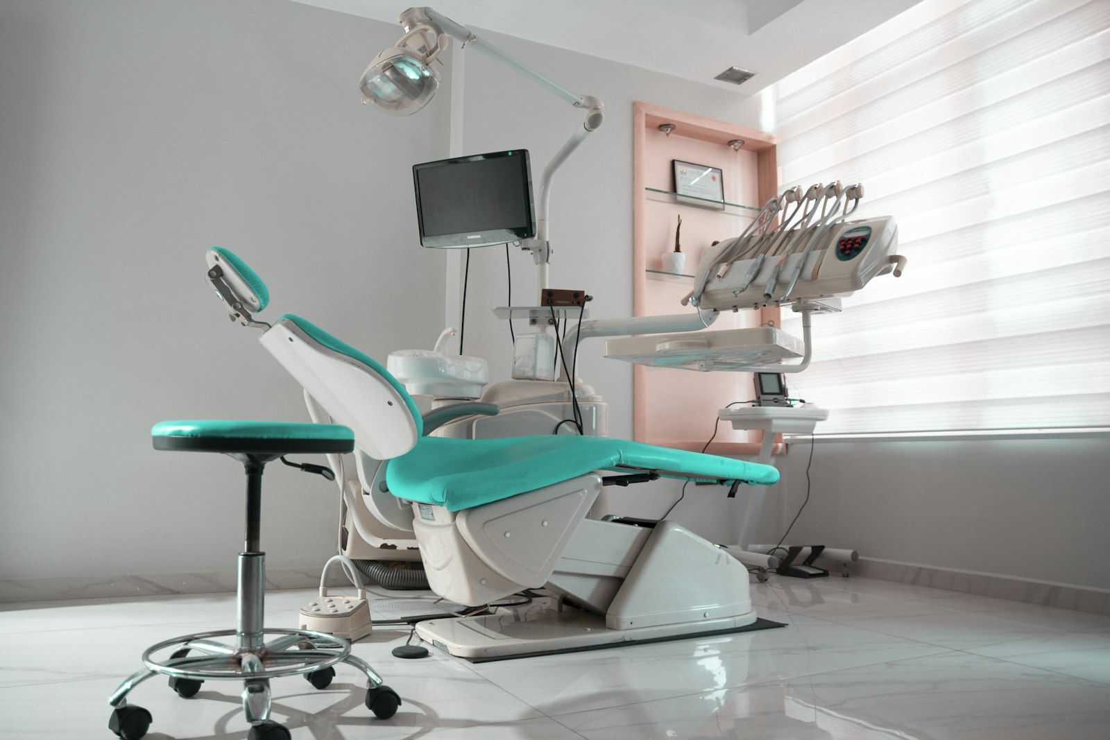 A patient receiving gentle, unhurried dental care at Lumen