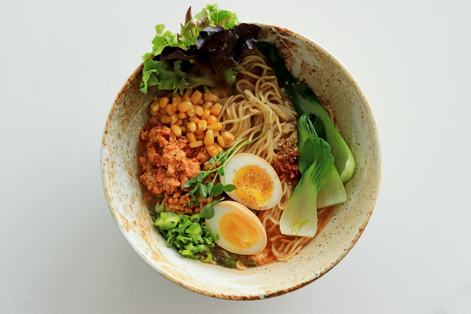 Close up of Kaen Ramen noodles in spicy tantanmen broth