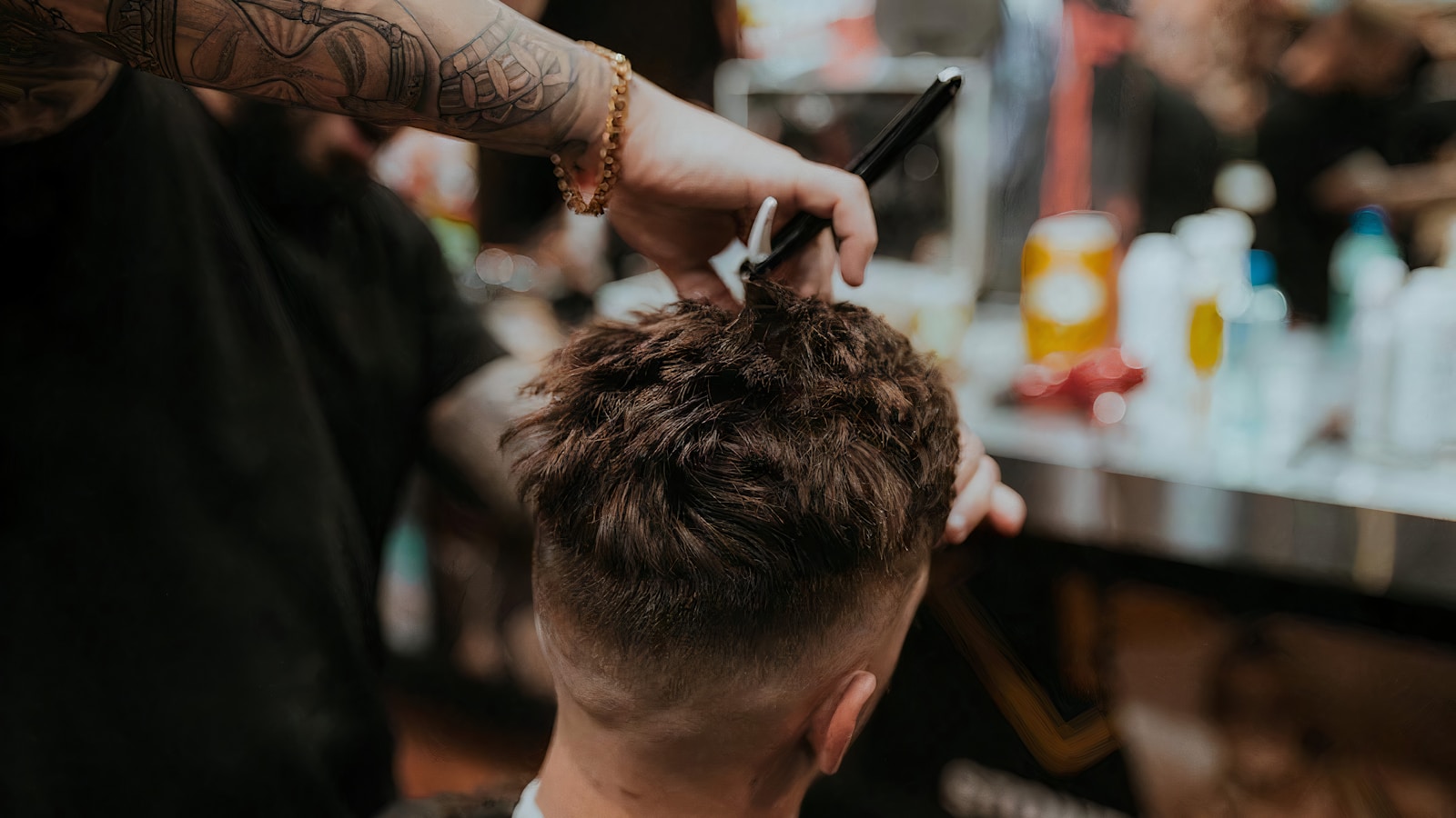 Fade haircut in progress at Golden Hair Salon